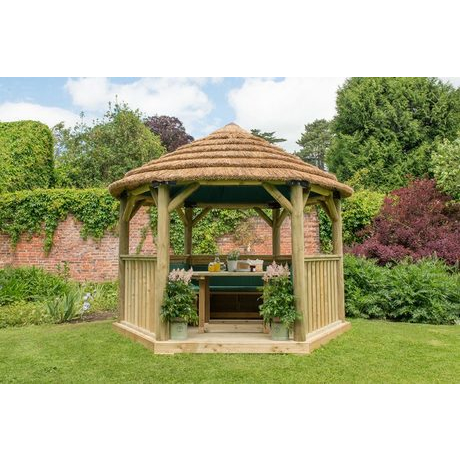 3.6M Premium Hexagonal Wooden Garden Gazebo with Thatched Roof & Lining - Furnished with table, benches & cushions (Green)